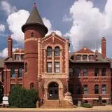 Photo by McGhiever, via Wikimedia Commons, https://commons.wikimedia.org/wiki/File:Minnesota_State_Public_School_Orphanage_Museum.jpg