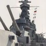 Photo by Dual Freq, via Wikimedia Commons, https://commons.wikimedia.org/wiki/File:USS_Alabama_(BB-60)_1994_forward_view_from_main_deck.jpg