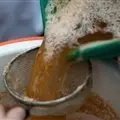 Cider being filtered.