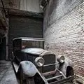 Packard in abandoned laboratory building complex.