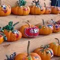 The kids will love painting silly faces on their pumpkins, but mom or dad may enjoy painting their favorite sports team's logo on theirs!