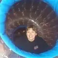 Peeking through the hamster ball.