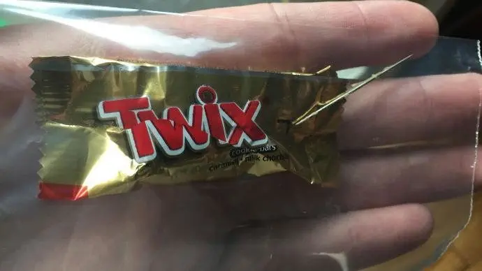 Boy Bites into Halloween Candy and Finds Needle photo