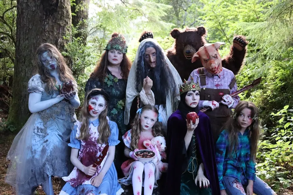 Spooky Cast Members pose for a 'family photo'
