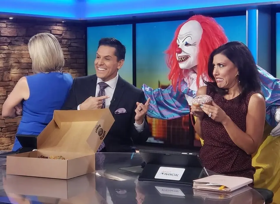 Scary Clown Delivers Donuts to Meteorologist photo